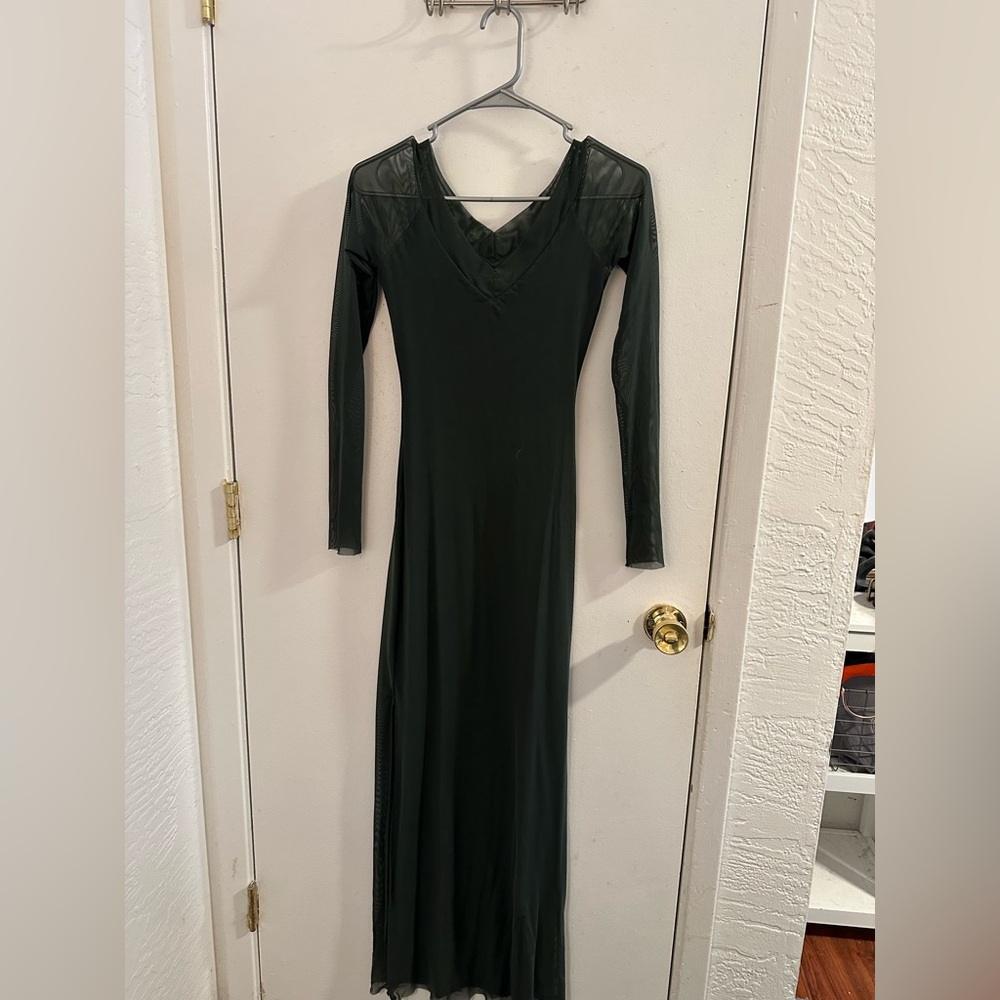 Silence & Noise forest green, long-sleeved, sheer mesh dress.